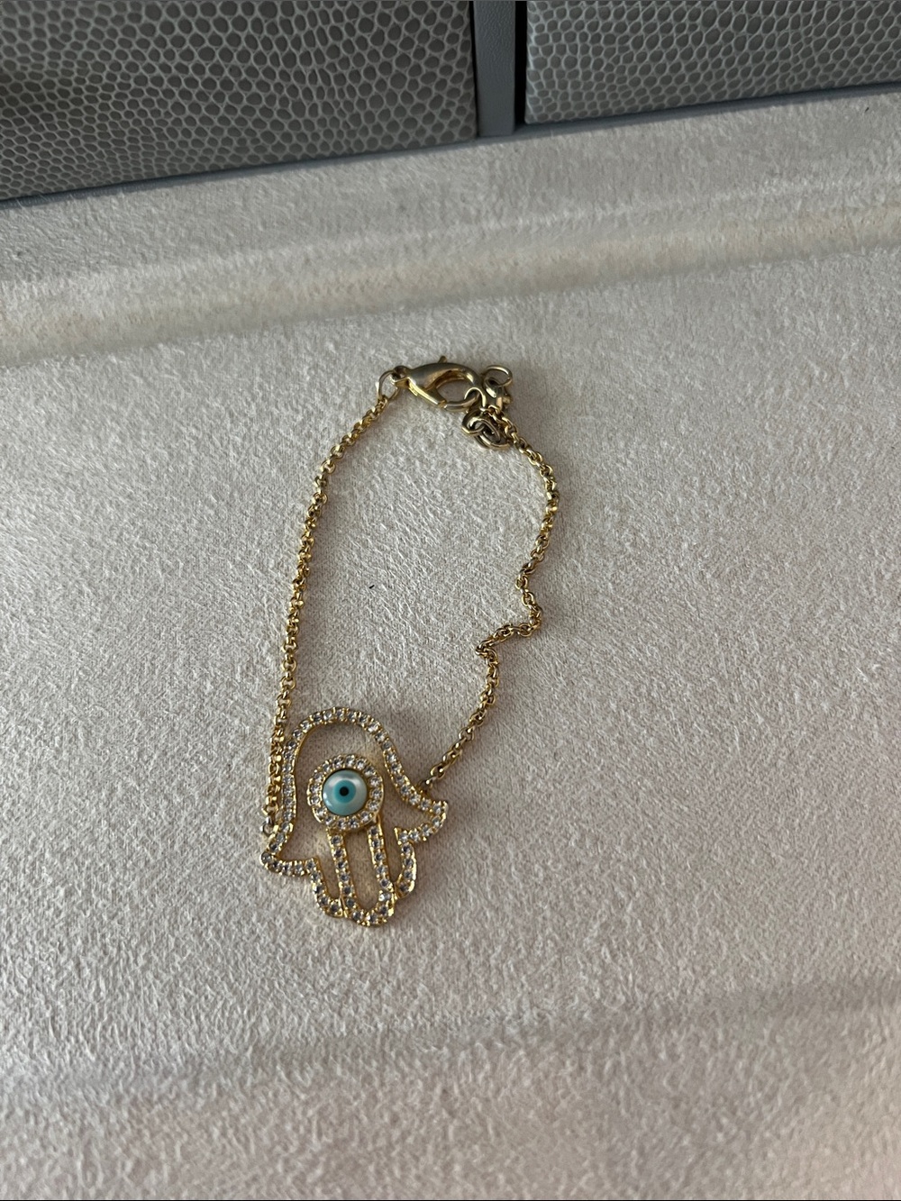 Gold Hamsa Hand Bracelet with Blue Evil Eye